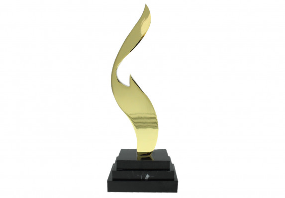 Metal award machined plated in 24k gold and mounted on tiered, black marble base.