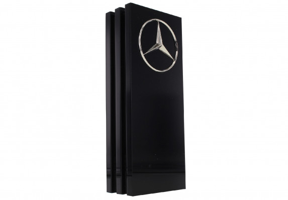 Standing plaque award in Lucite with metal detailing and shiny silver logo.