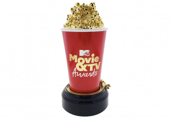 Iconic popcorn bucket trophy with cast metal popcorn plated in 24k gold. This playful sculpture is presented each year to the world's most accomplished actors at the world-famous event.