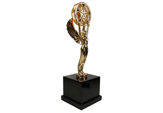 Gold angel with film reel statue on black base