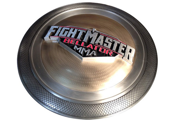 Actual full sized brass and pewter wearable shield created as a trophy with thick embossed letters cross hatch pattern and hammered copper