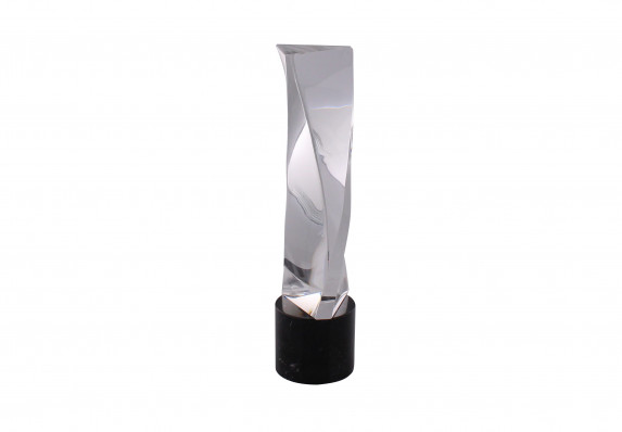 A custom crystal recognition award sculpture with prismatic presence presented to music industry professionals.