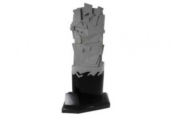 Unique custom trophy with geometric top form in gray that intertwines with sleek black base.