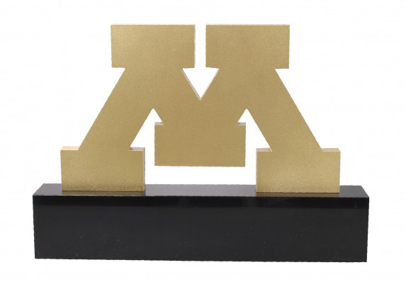 Machined metal logo on painted wood base.