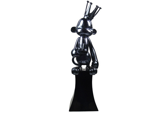 Custom cast sculpture award monkey with crown curly tail and video controller in mirror shiny black gunmetal plating