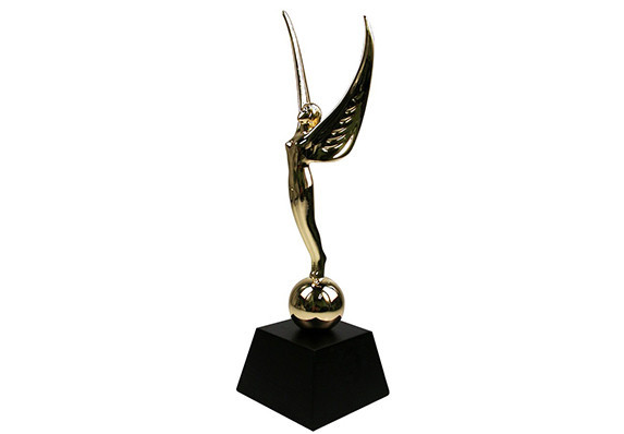 Custom gold plated cast metal award which replicates the sculpture on the front of the iconic Manhattan Waldorf-Astoria building