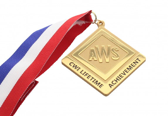 A custom gold-plated medallion for association member's lifetime achievement. This custom luxury medal is presented on a red, white, and blue ribbon.