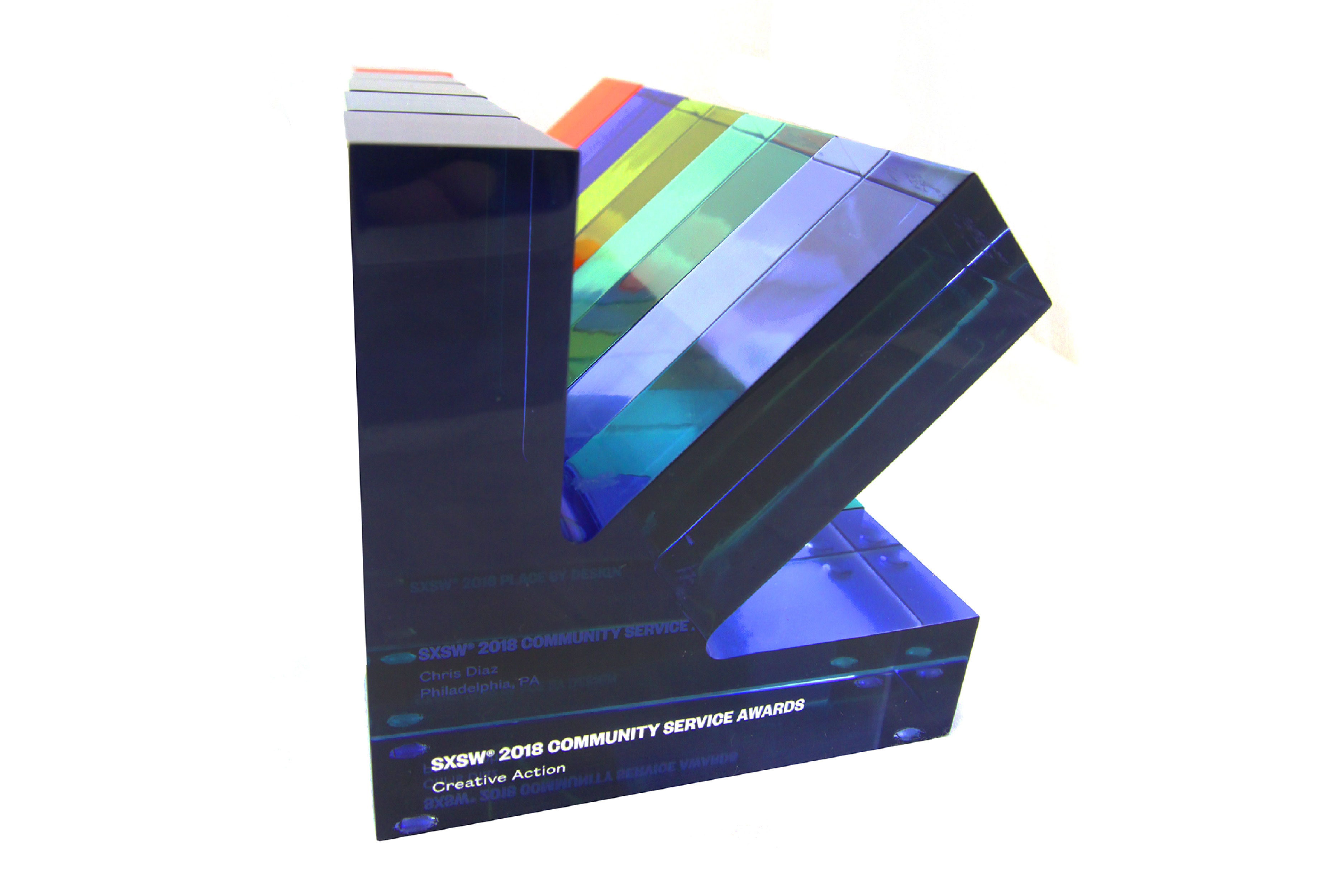 Machined Lucite arrow trophy for a famous festival. A variety of colors were used to denote the various events – education, technology, community service, etc.