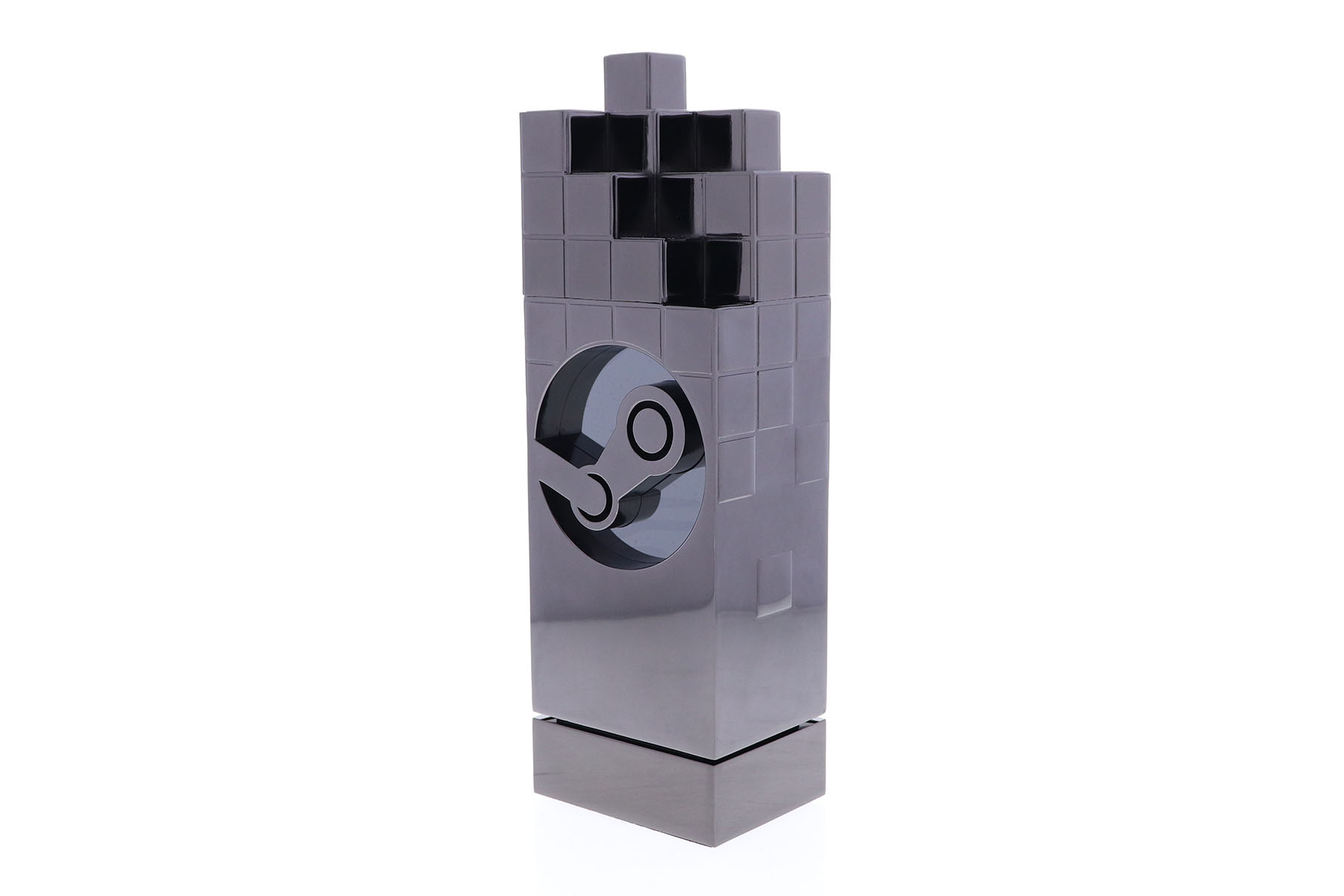 Black nickel building block award with a gear shaped cut-out