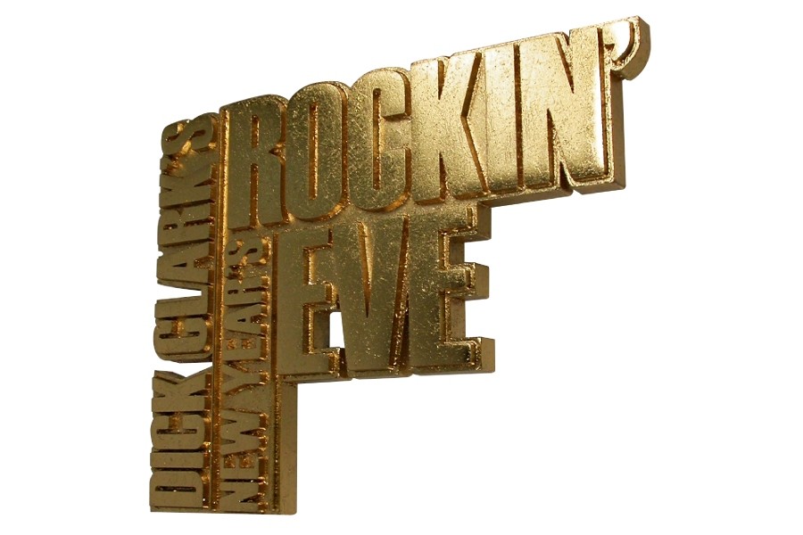 Corporate gold logo medallion for Dick Clark