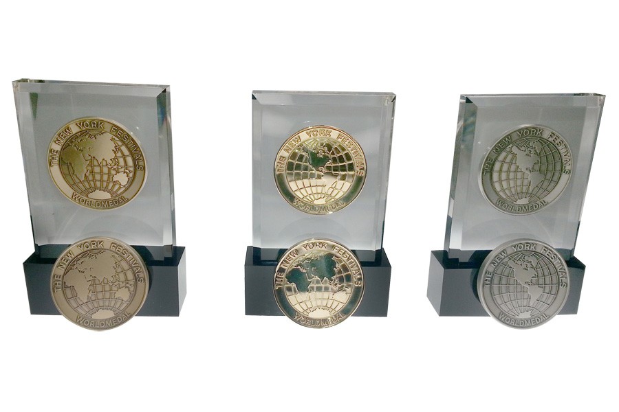 Lucite embedment awards with globe medallion