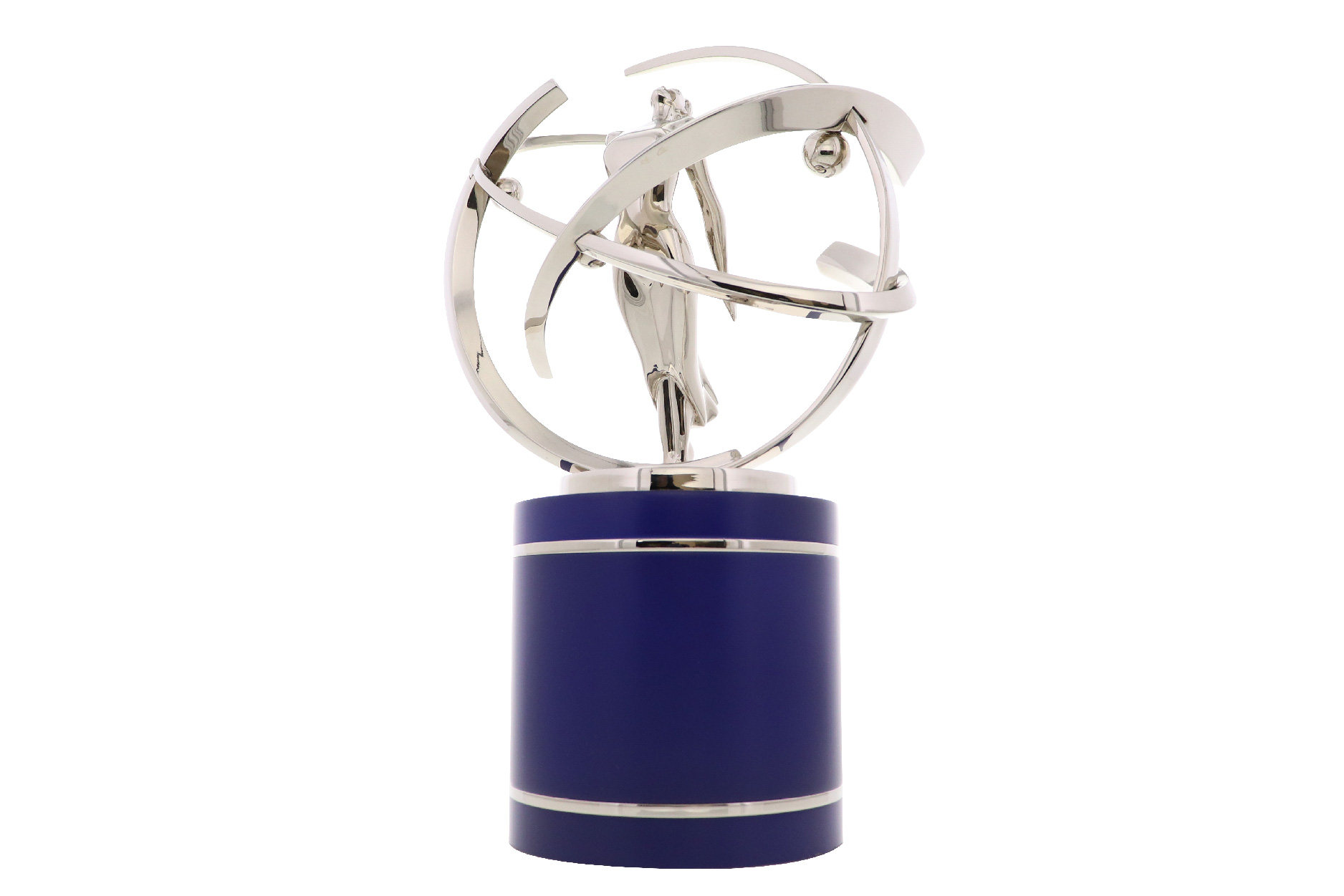 Silver statuette atop a blue base.