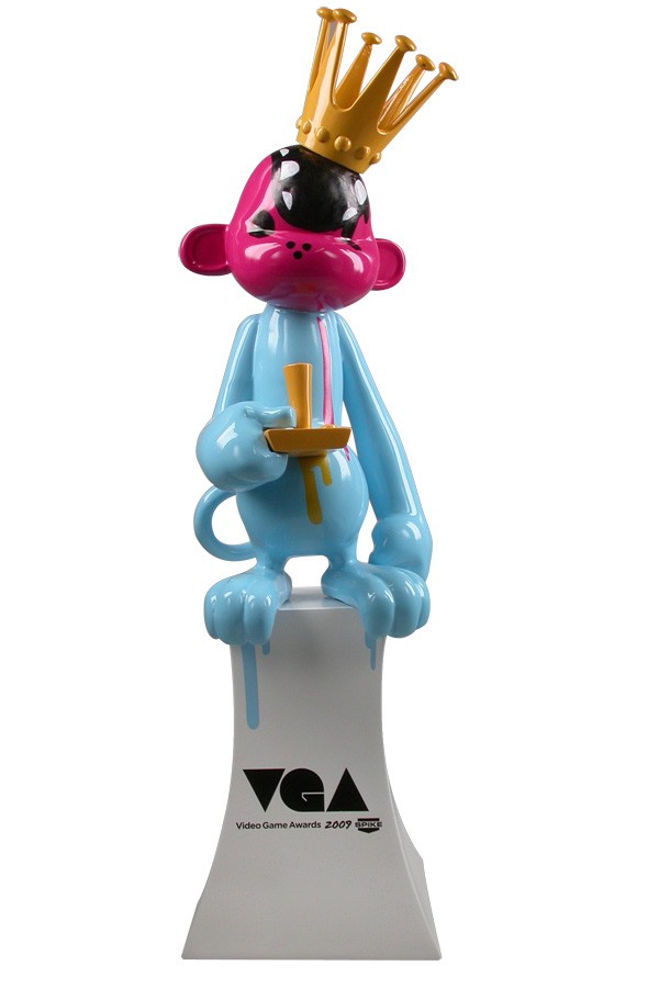 Corporate monkey award in pink and blue