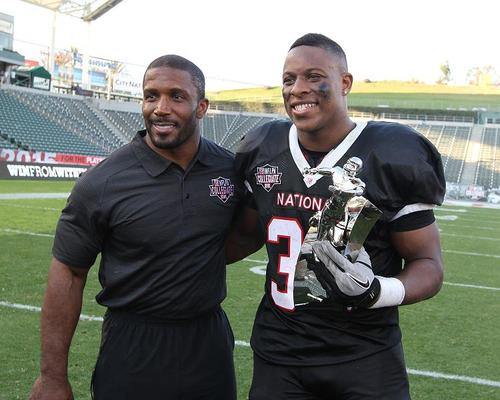 Terrell Watson in NFLPA Nationals uniform with his Collegiate Bowl MVP Trophy