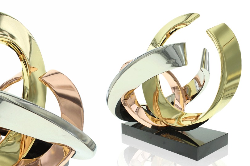 Close up detail of Rings 1. 2 views, up close view of the three interlocking rings, viewed at angle