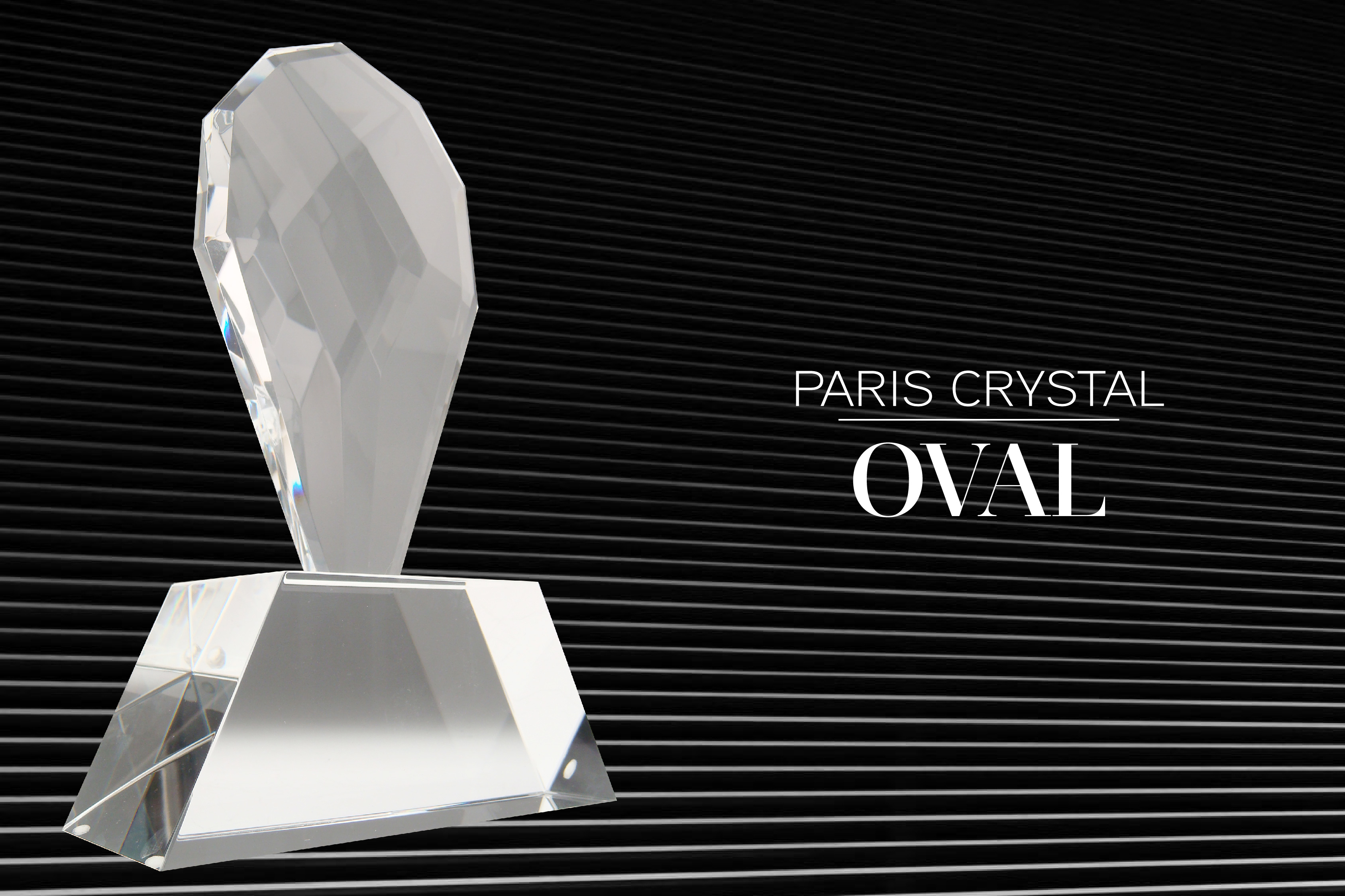 Oval shaped, faceted crystal award oval trophy mounted on base