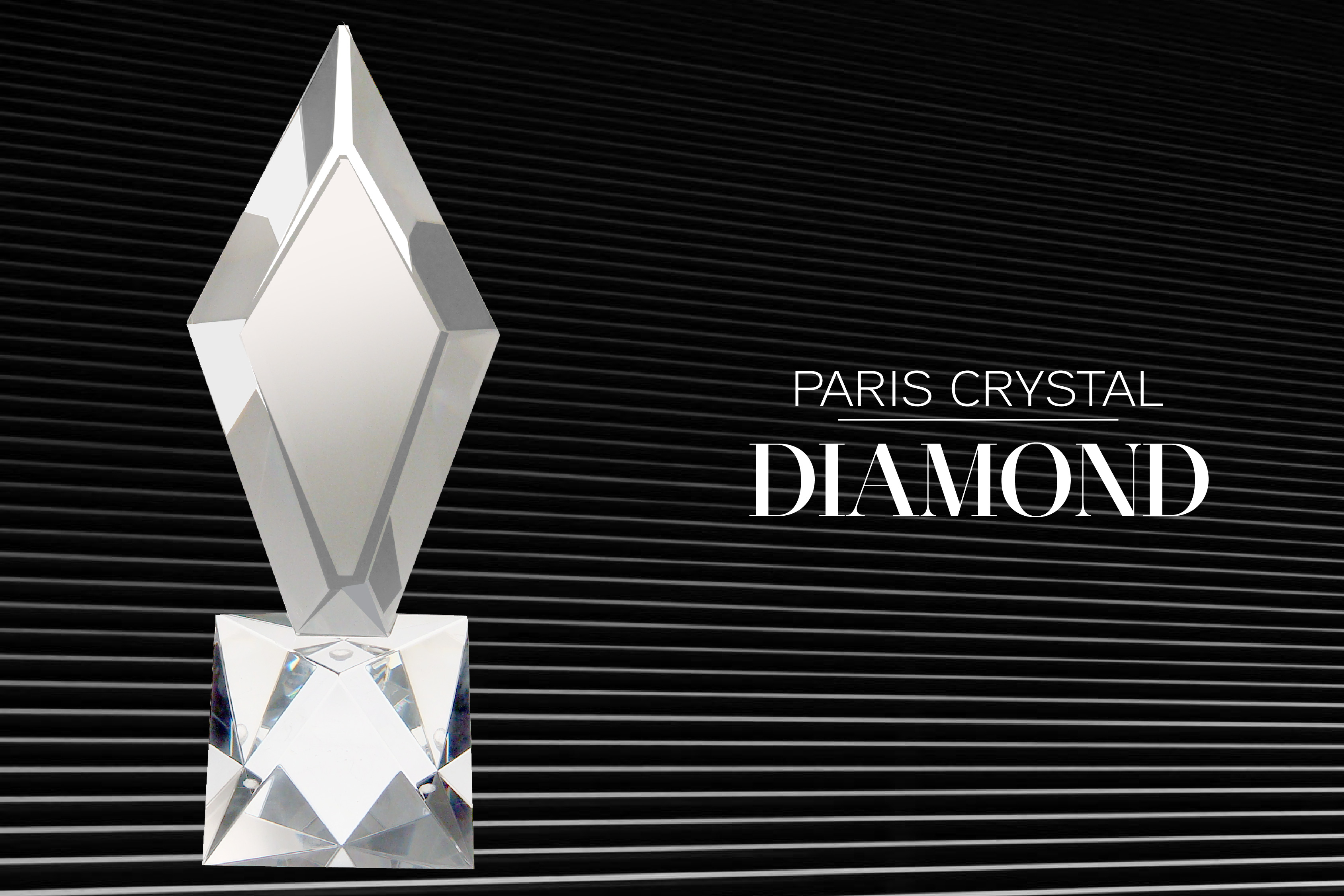 Diamond shaped crystal award mounted on geometric base