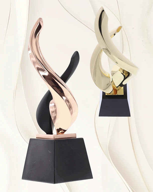Nambe Lark and twist awards in gold rose gold and matte black