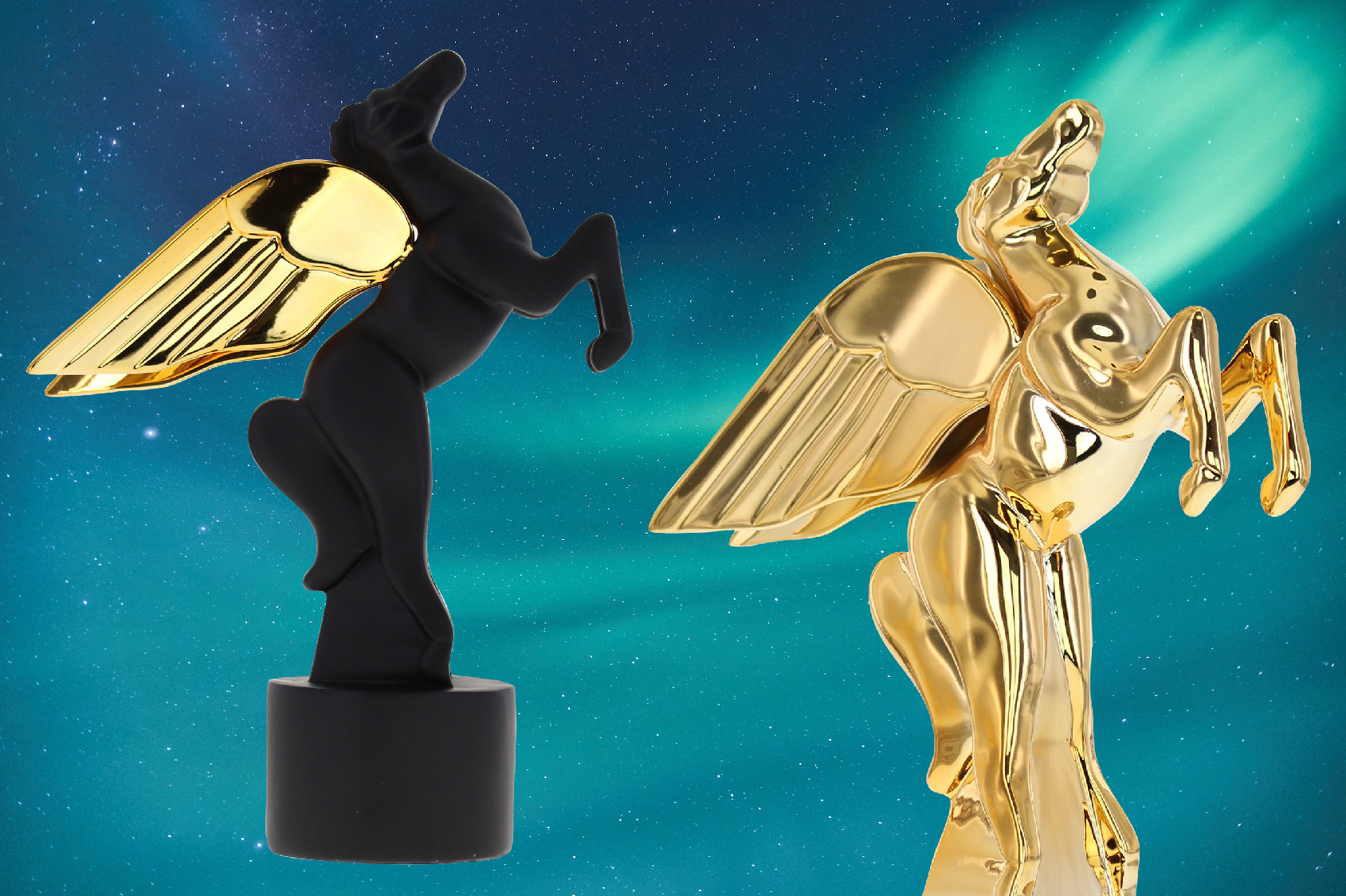 Two custom gold pegasus trophies flying into the night sky