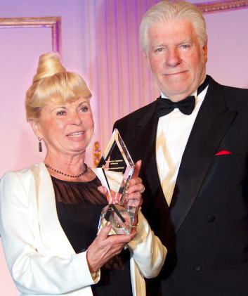 Kari Clark accepting the Broadcasters Foundation of America Lifetime Achievement Award on behalf of her husband, Dick Clark.