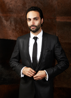 David Moritz, President and CEO of Society Awards. Mr. Moritz is pictured wearing a black suit, white shirt and black tie.