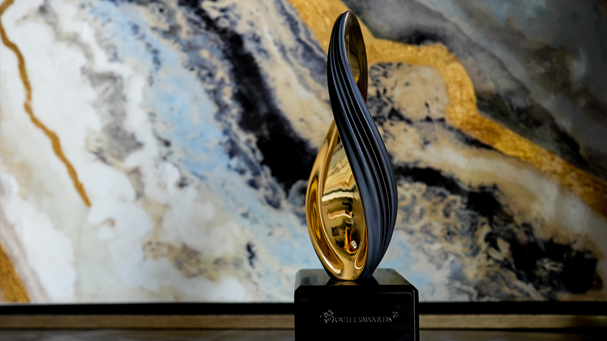 Society Twist Texture exclusive award with a black and gold marble background