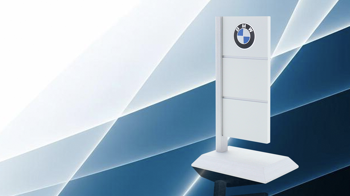 A BMW dealership white flag made into a trophy on a blue and white background