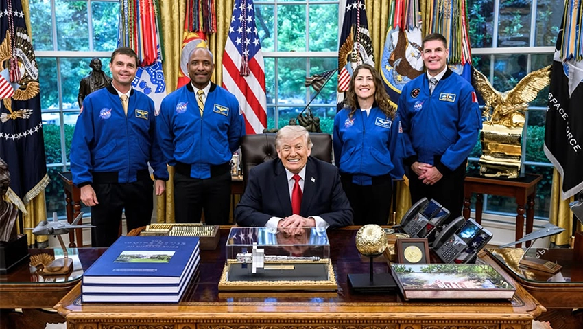 President Trump with the Artemis II Mission Astronauts with the Artemis II Golden Moon Trophy sitting in the Oval Office.