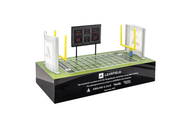 Crystal Football Field Deal toy with white text on base