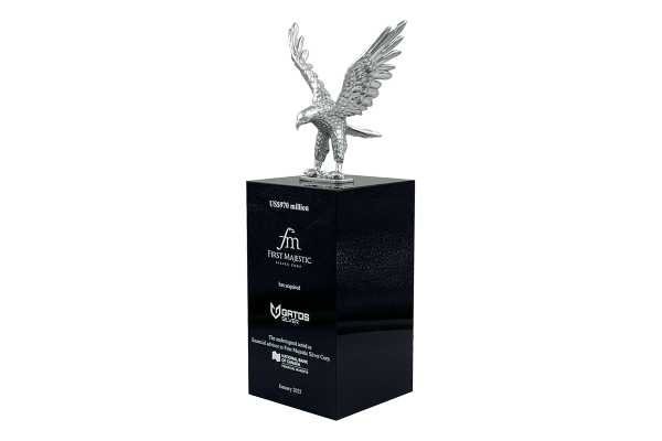 High end metal falcon tombstone on black crystal pillar
