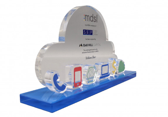 Color printed financial tombstone on crystal cloud with cut-out icons on a blue base. This deal gift was presented for a technology acquisition.