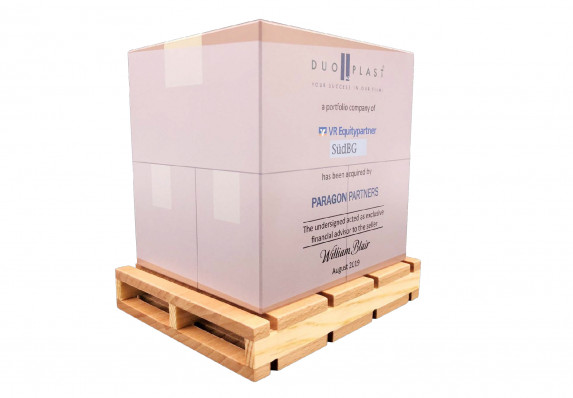Acrylic block with financial transaction details is made to look like a stack of boxes, The form is presented on a model wood pallet