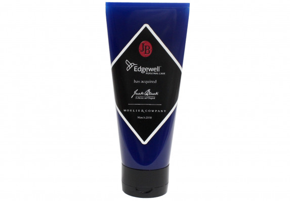 Deal gift created in the shape of a cosmetic tube in honor of an acquisition.