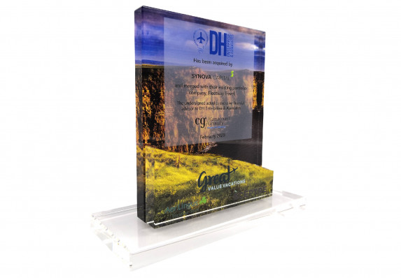 Color printed plaques and financial transaction details presented for an airline deal.