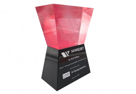 A sculptural, luxury deal gift with 3D etch logo and high-end color-fill financial transaction details.