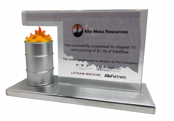 Deal toy presented for a Chapter 11 liabilities restructuring. Reverse printed central plaque with the financial details is presented on a metal base with a barrel model.