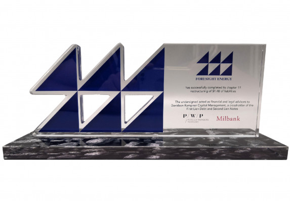 Custom-cut blue logo deal gift with color printing presented for a chapter 11 restructuring deal.