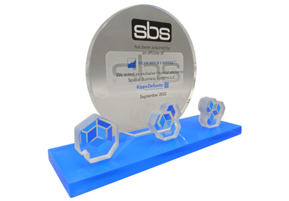 Clear crystal circle with custom cut crytal on blue base