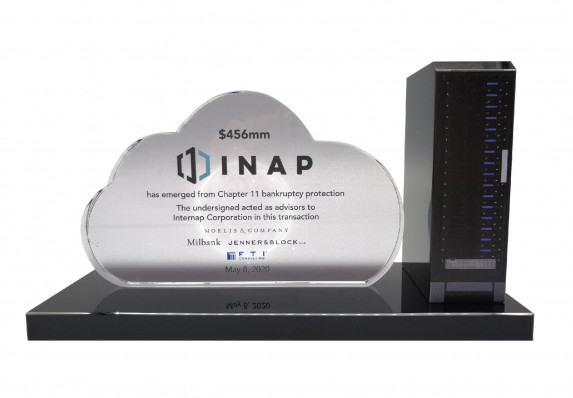 A chapter 11 bankruptcy protection deal toy with a model server and a cloud tombstone plaque.