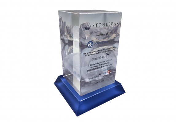 A reverse color printed deal toy for a telecommunications acquisition deal.