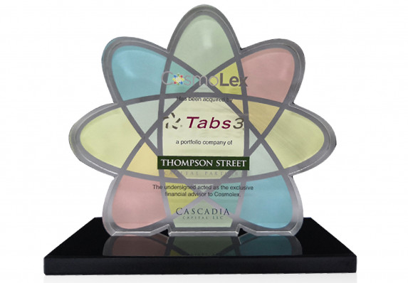 A plaque-on-base tombstone is elevated with a custom cut logo shape and reverse color printing.