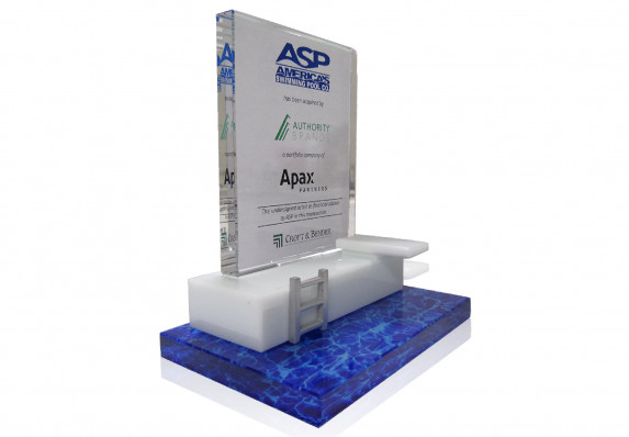 This tombstone combines a classic transaction details plaque with a playful custom model pool, ladder and diving board.