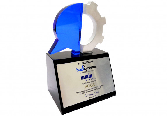 Two-part, laser-cut logo mounted on base with financial transaction text and logos on attached plaque.