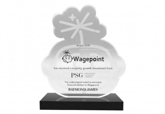 A custom-cut logo-based financial tombstone with reverse etching and printed transaction details and logos.