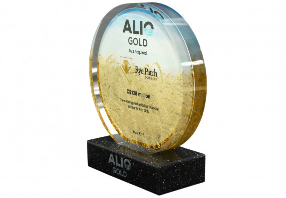 Acquisition deal gift has color printed reverse image and logos and financial tombstone text.