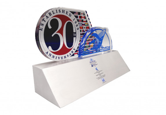 This unique financial tombstone combines multiple color printed plaques on a high-end, tapered base with the transaction details.