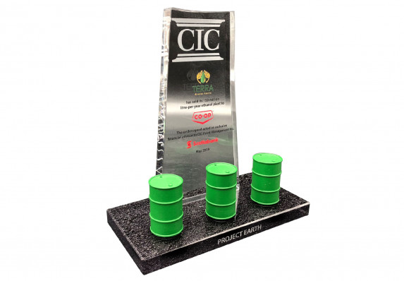 Model oil barrels are mounted on an etched logo marble base with crystal tombstone plaque in this luxury deal gift by Society Awards Finance Group.