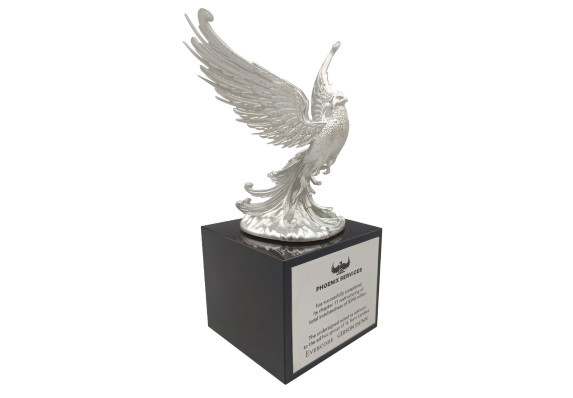 Financial tombstone with a highly detailed 3-D model of a phoenix on a black crystal base with a metal plate