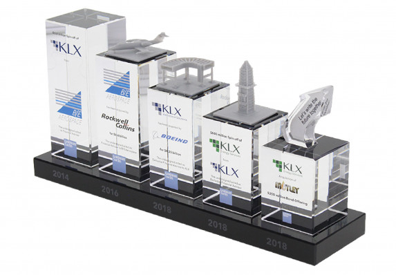 This is the first deal toy to benefit from Society Awards Finance Group's in-house 3D printing capabilities. A series of deals, spanning several years is represented in tiered columns with 3D printed decorations.