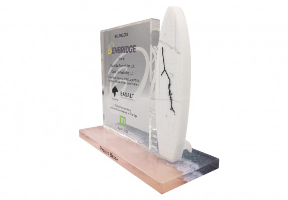 Deal toy with reverse color printing, etching, crystal plaque, and model surfboard.